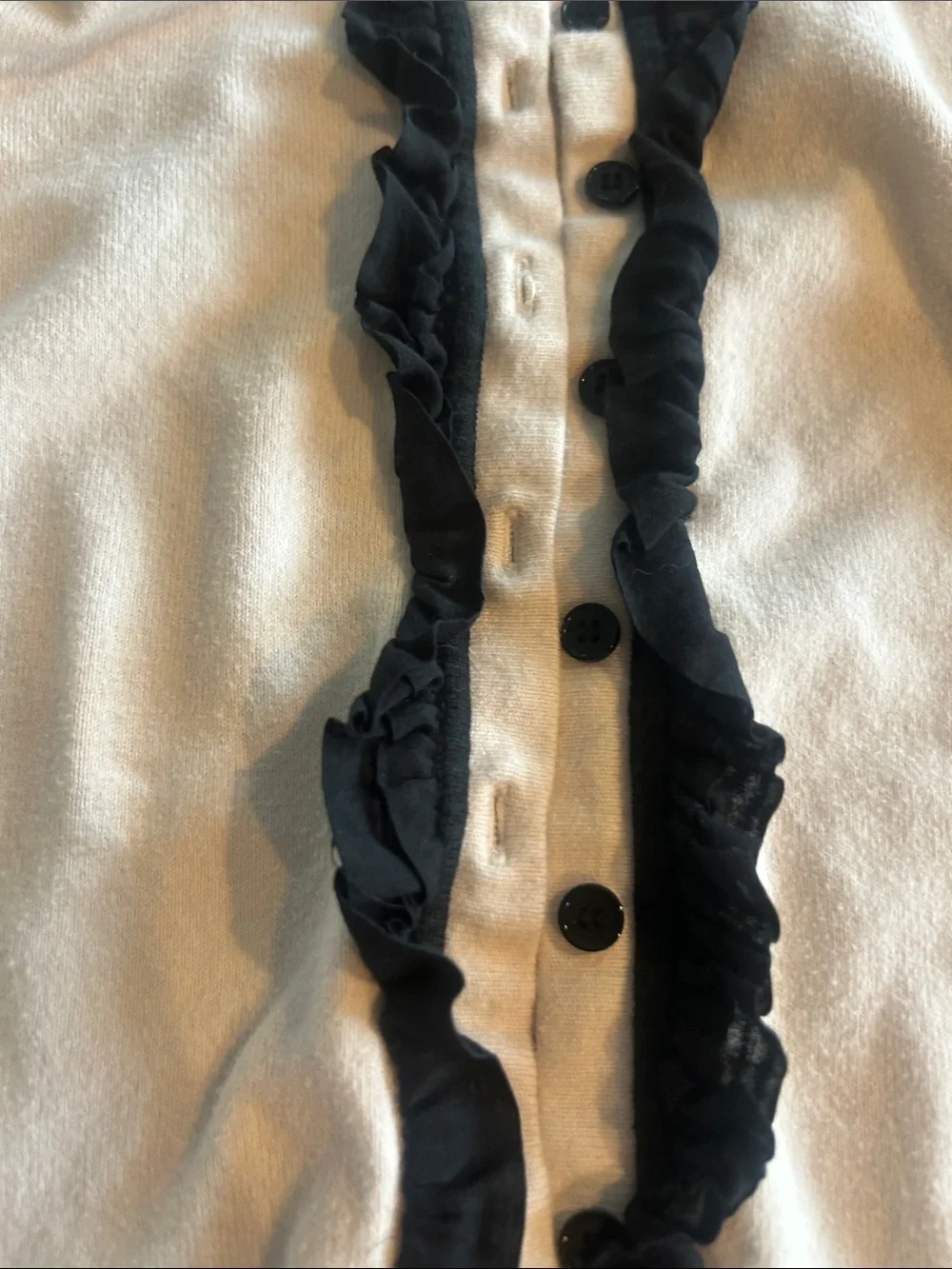 The Limited White Cardigan with Black Ruffle Trim
